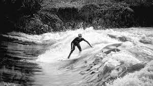 Early Whitewater surfer
